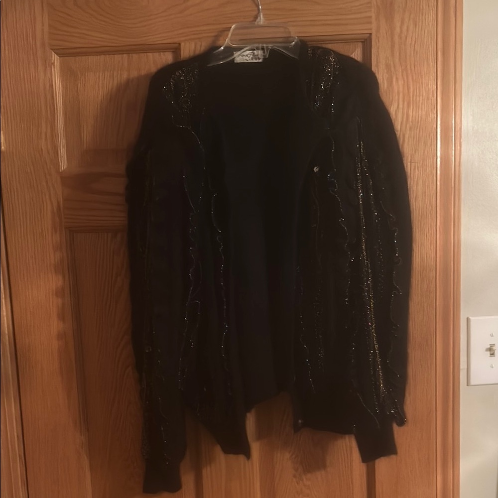 Elegant Black Sweater with Gold Accents